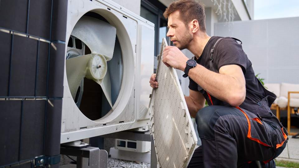 Technician working on a high quality AC unit installation