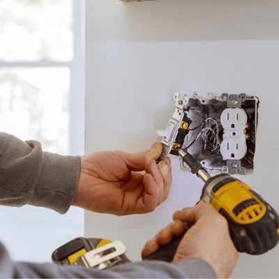 Technician working on a high quality AC unit installation